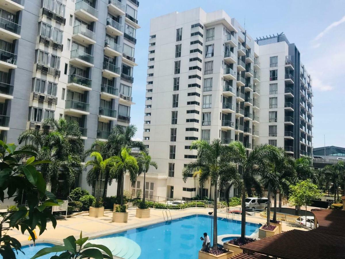 One Palm Tree Villas Across Naia-T3 Manilla Buitenkant foto